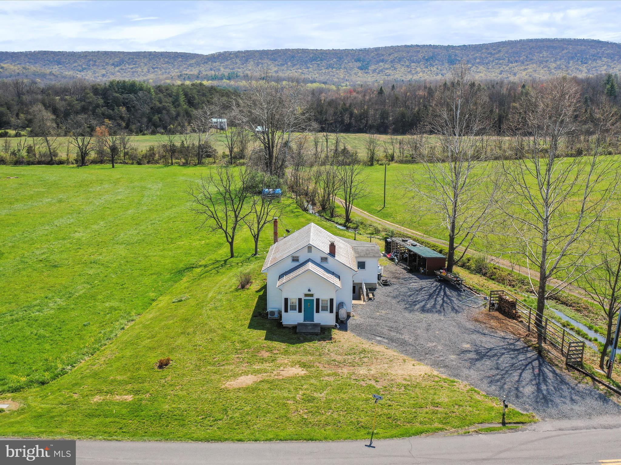 8610 Fort Valley Road Fort Valley, VA 22652 - Photo 2 of 61 a view of a lake with a yard