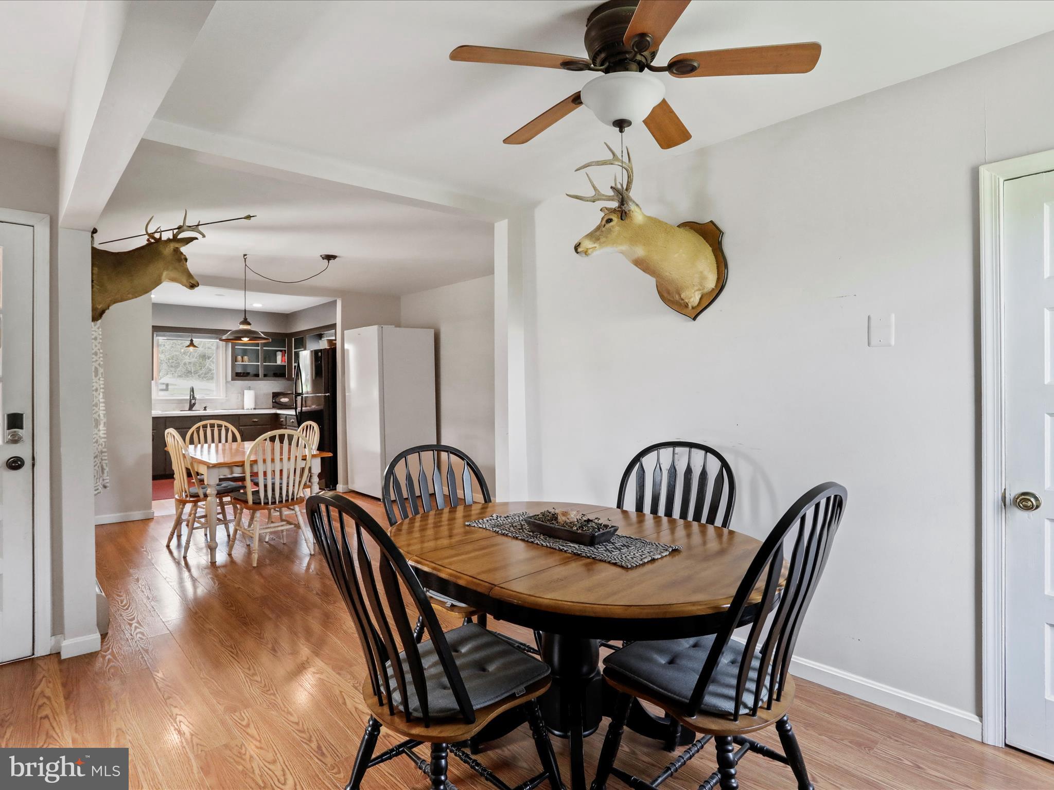 8610 Fort Valley Road Fort Valley, VA 22652 - Photo 28 of 61 a view of a dining room and wooden floor