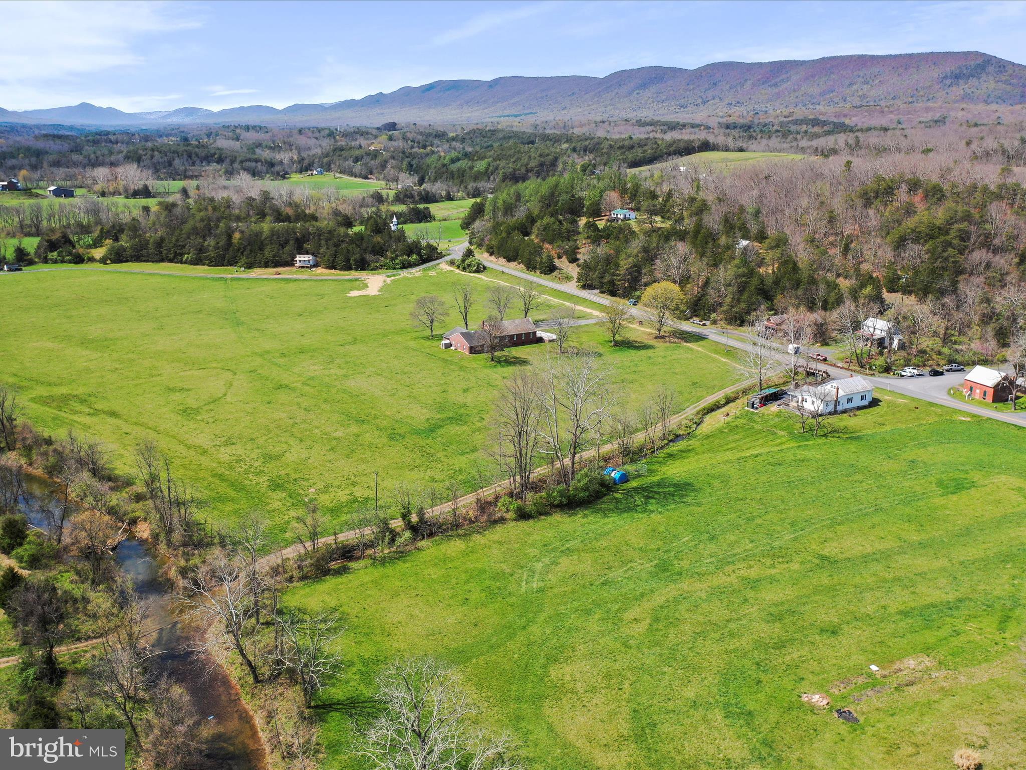 8610 Fort Valley Road Fort Valley, VA 22652 - Photo 58 of 61 a view of a lush green hillside and houses