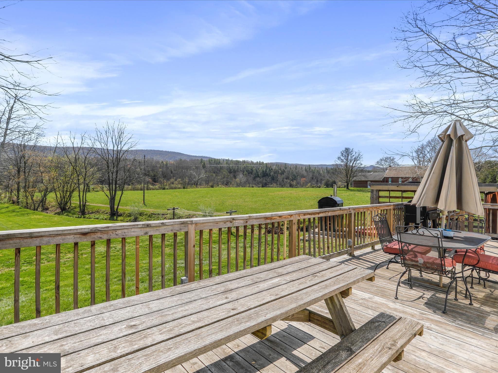 8610 Fort Valley Road Fort Valley, VA 22652 - Photo 7 of 61 a view of roof deck with patio