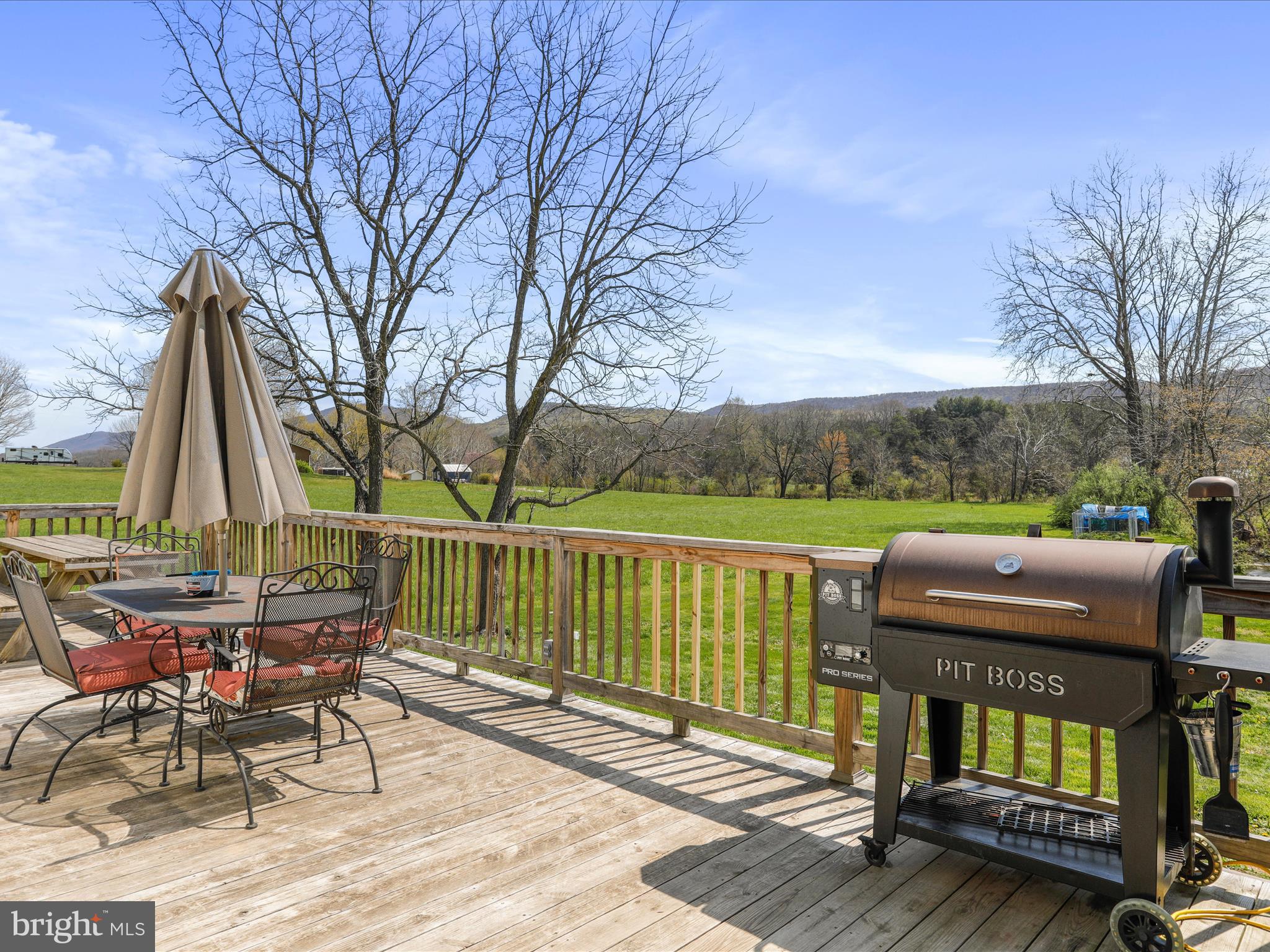8610 Fort Valley Road Fort Valley, VA 22652 - Photo 8 of 61 a view of a chairs and table in the patio