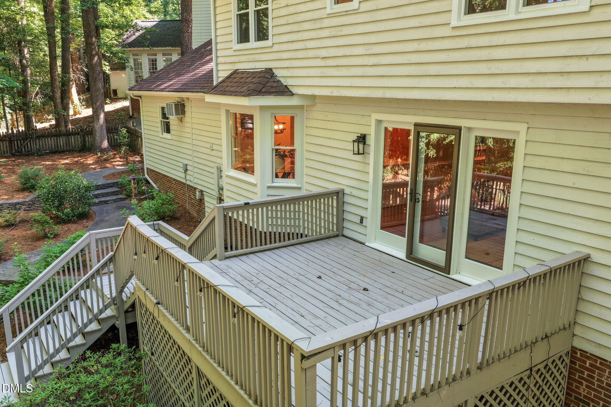 18 Strawberry Ridge Lane Durham, NC 27713 - Photo 41 of 59 a view of backyard with deck and outdoor seating