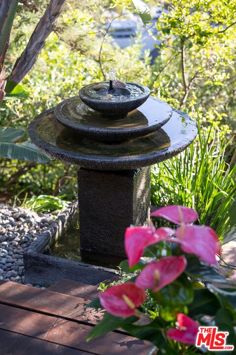 6464 Bryn Mawr Drive Los Angeles, CA 90068 - Photo 20 of 23 a view of a backyard with plants and a patio