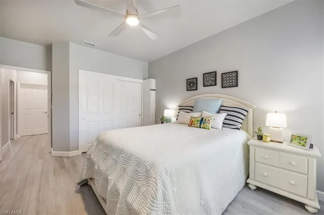 a bedroom with a bed and a dresser