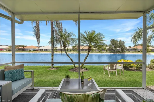 a view of a chairs and table in the patio