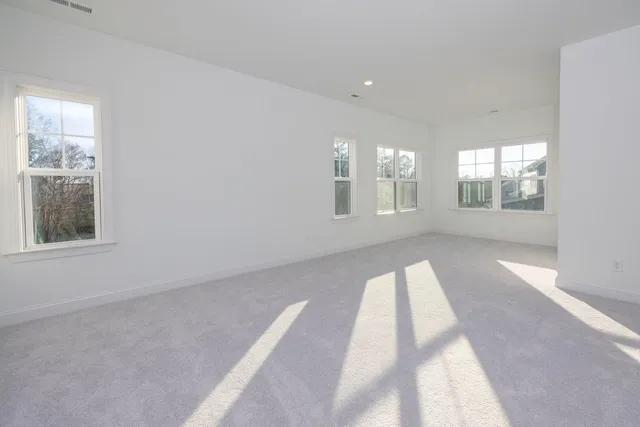 a bathroom with a granite countertop sink mirror and bathtub