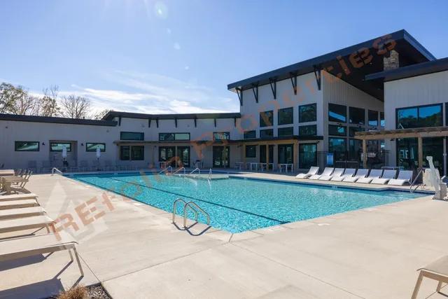 a view of a chairs and table in a patio