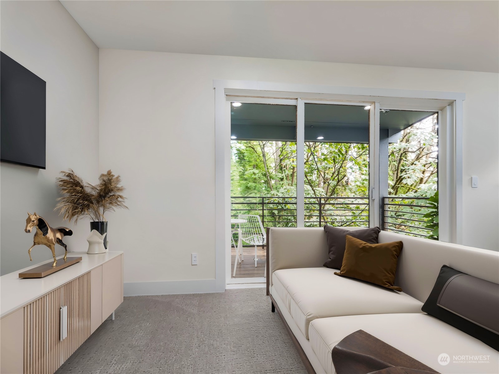 407 Southwest Thistle Street Seattle, WA 98106 - Photo 15 of 40 a living room with furniture and a flat screen tv