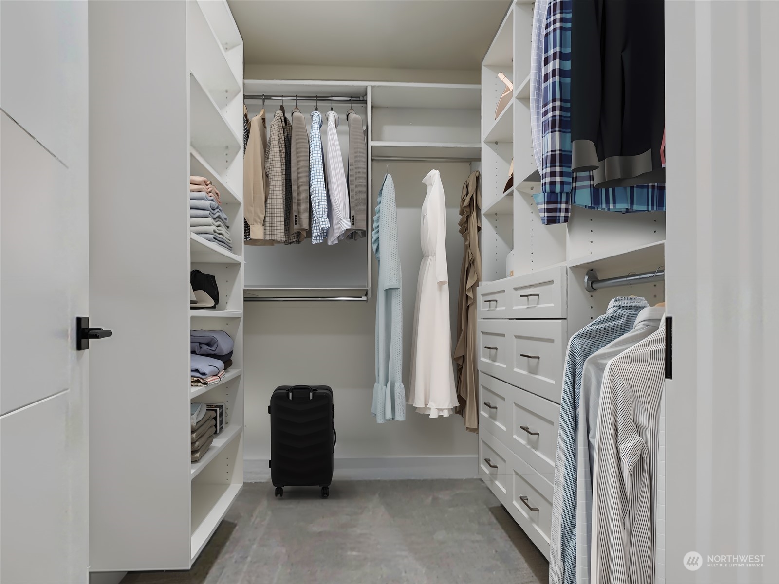 407 Southwest Thistle Street Seattle, WA 98106 - Photo 18 of 40 a view of walk in closet with clothes and shoes