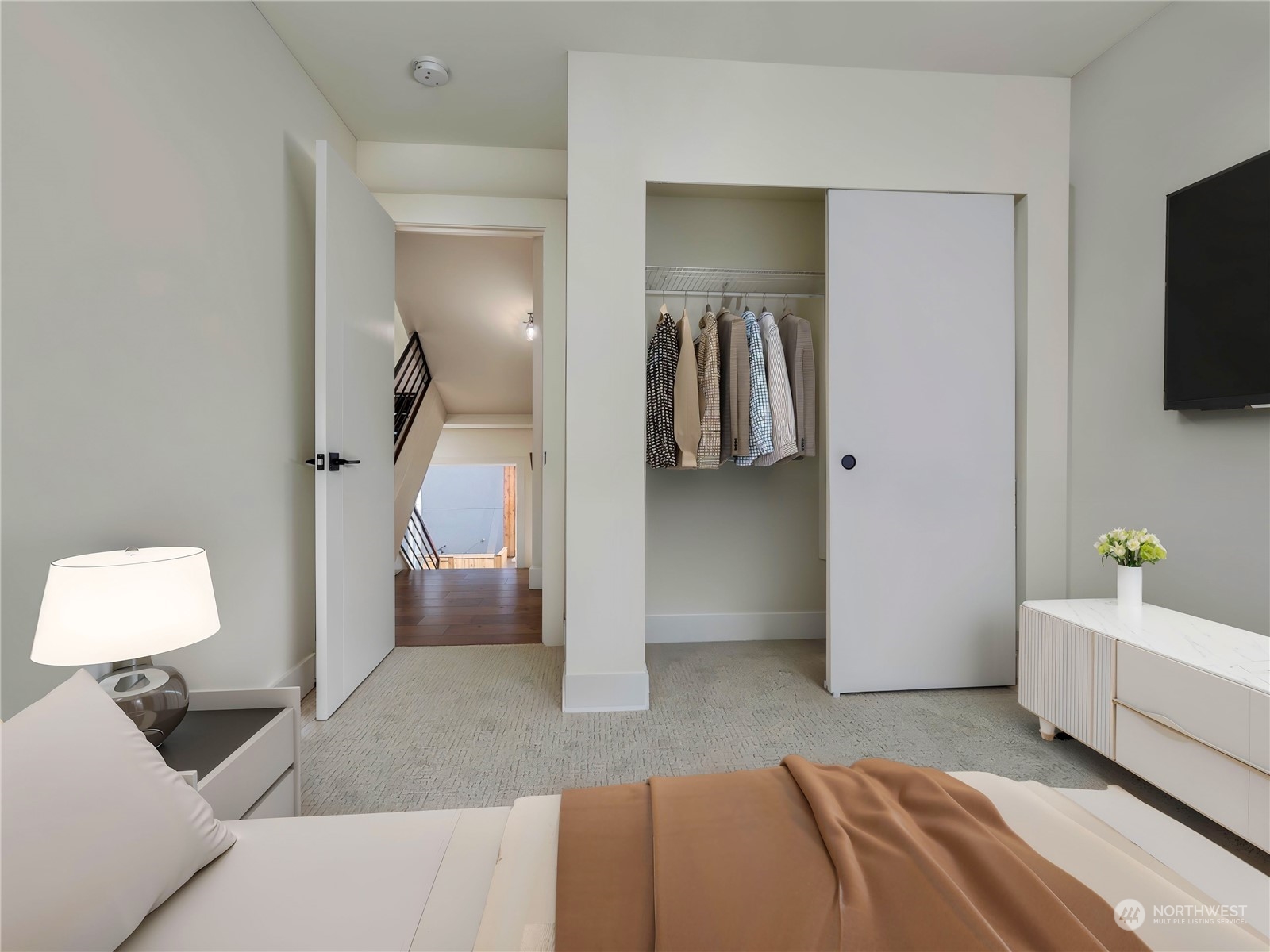 407 Southwest Thistle Street Seattle, WA 98106 - Photo 20 of 40 a bedroom with a bed and a television