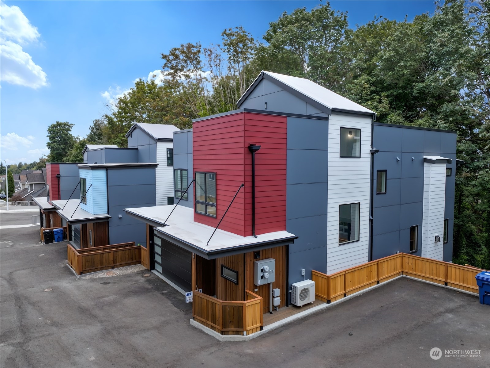 407 Southwest Thistle Street Seattle, WA 98106 - Photo 3 of 40 a view of a house with a yard and roof