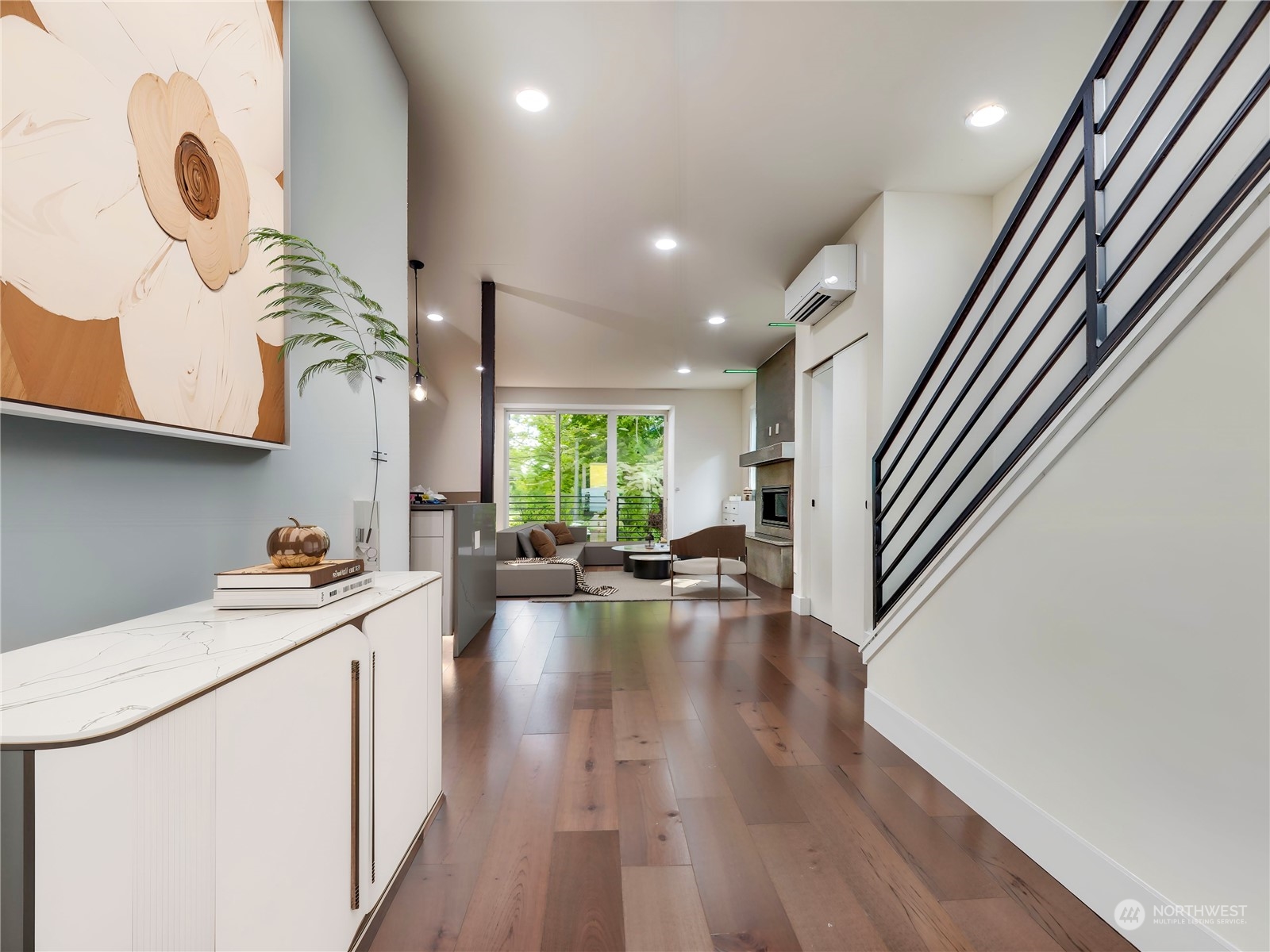 407 Southwest Thistle Street Seattle, WA 98106 - Photo 5 of 40 a view of living room with furniture and wooden floor