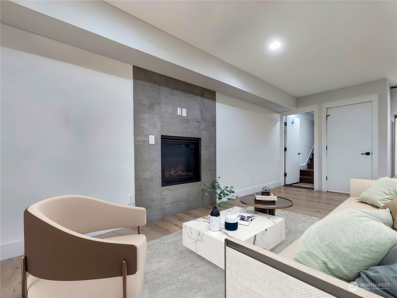 407 Southwest Thistle Street Seattle, WA 98106 - Photo 6 of 40 a living room with furniture and a flat screen tv