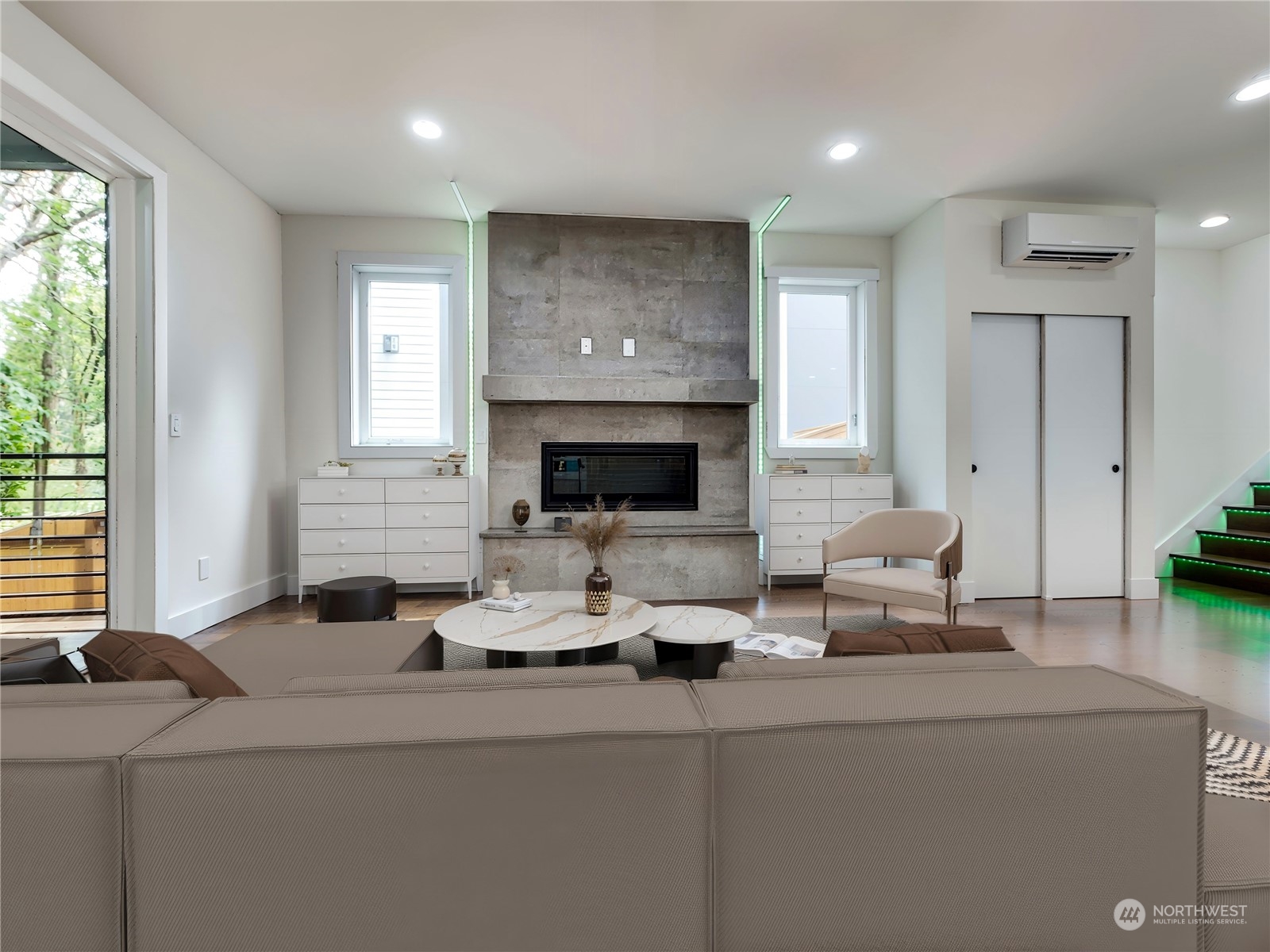 407 Southwest Thistle Street Seattle, WA 98106 - Photo 8 of 40 a living room with furniture a fireplace and a large window