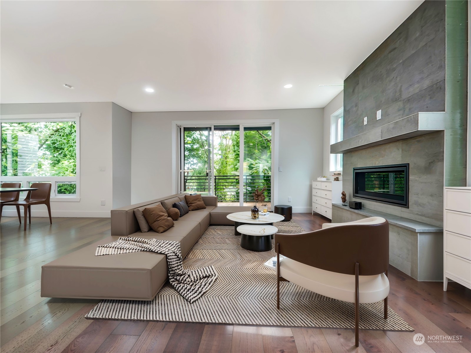 407 Southwest Thistle Street Seattle, WA 98106 - Photo 10 of 40 a living room with furniture a flat screen tv and a large window