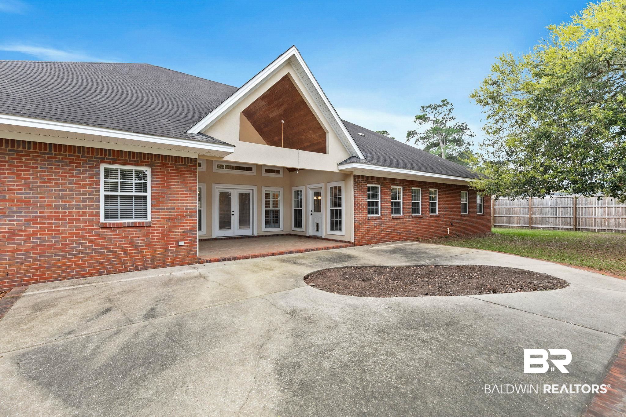 3668 Claridge Road North Mobile, AL 36608 - Photo 94 of 100 Rear view of house featuring french doors, a patio, brick siding, and a shingled roof