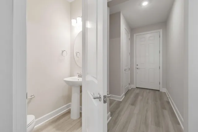 a view of storage and utility room with washer and dryer