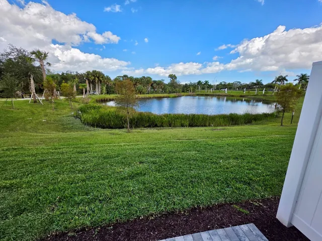 a picture of a bench in front of a wall