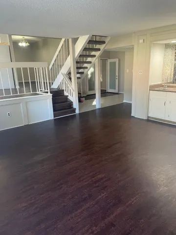 an empty room with a fireplace