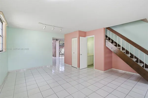 a view of an entryway with stairs