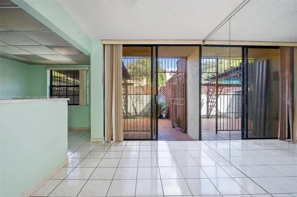 a view of a entrance door of the room