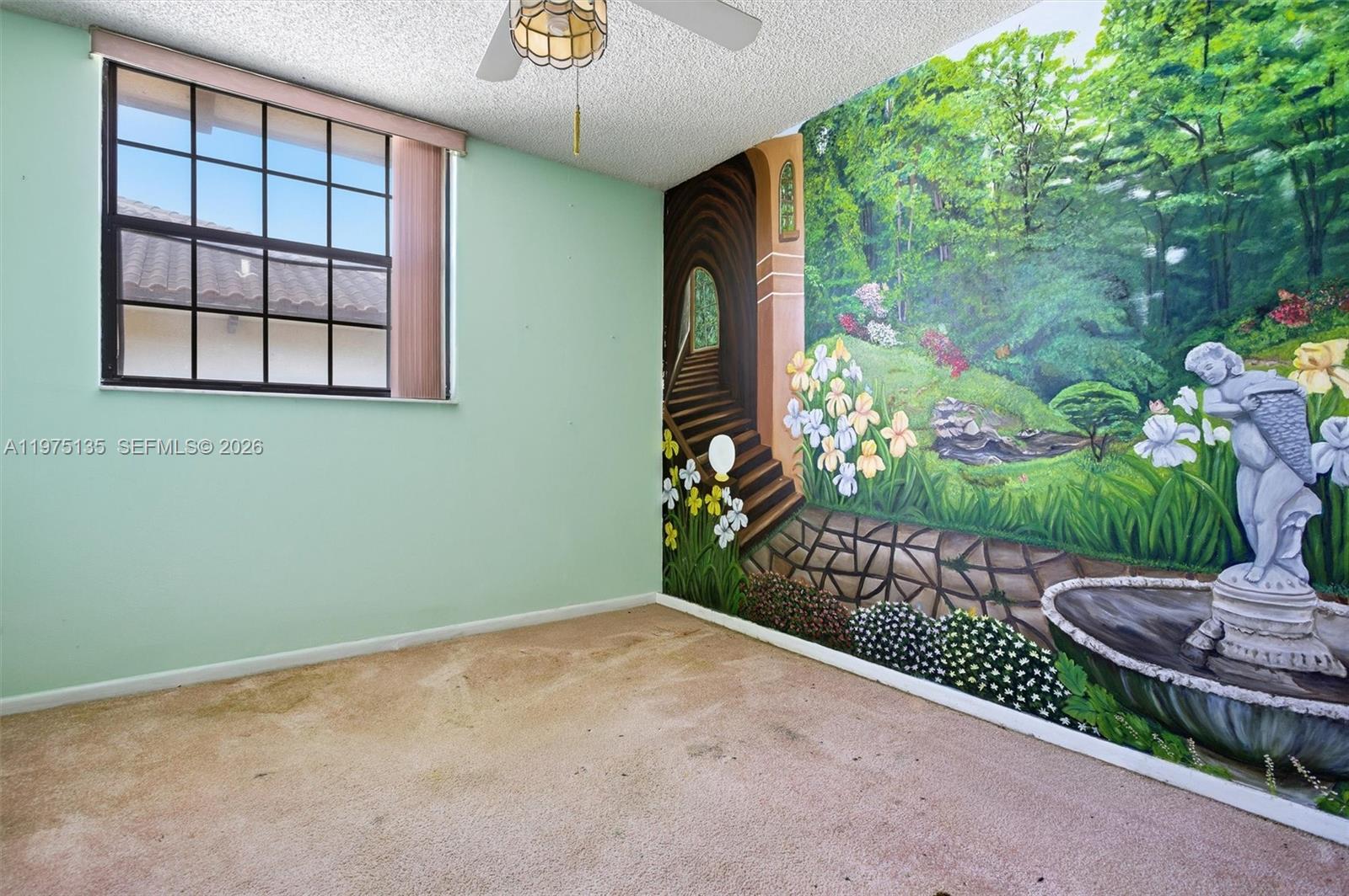 12253 Southwest 16th Terrace, Unit 108M Miami, FL 33175 - Photo 24 of 50 a view of backyard with potted plants