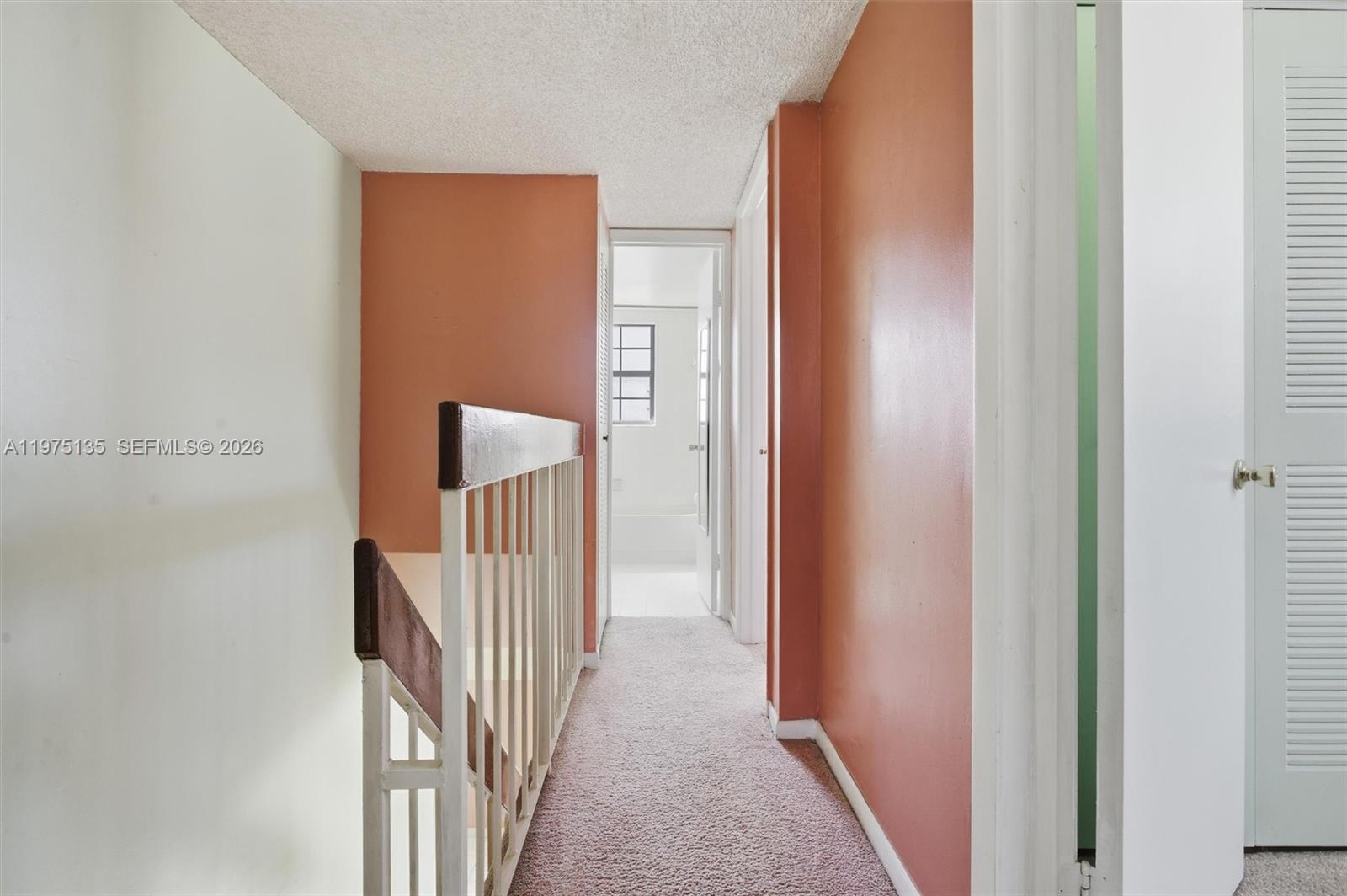 12253 Southwest 16th Terrace, Unit 108M Miami, FL 33175 - Photo 31 of 50 a view of a hallway with a door