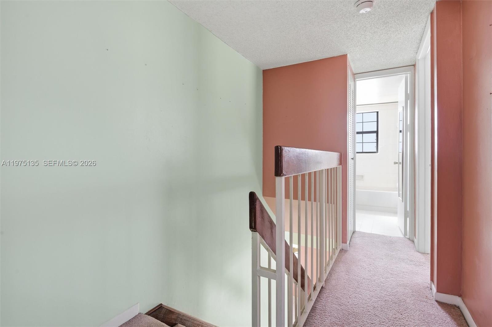 12253 Southwest 16th Terrace, Unit 108M Miami, FL 33175 - Photo 32 of 50 a view of a hallway with wooden floor and entryway