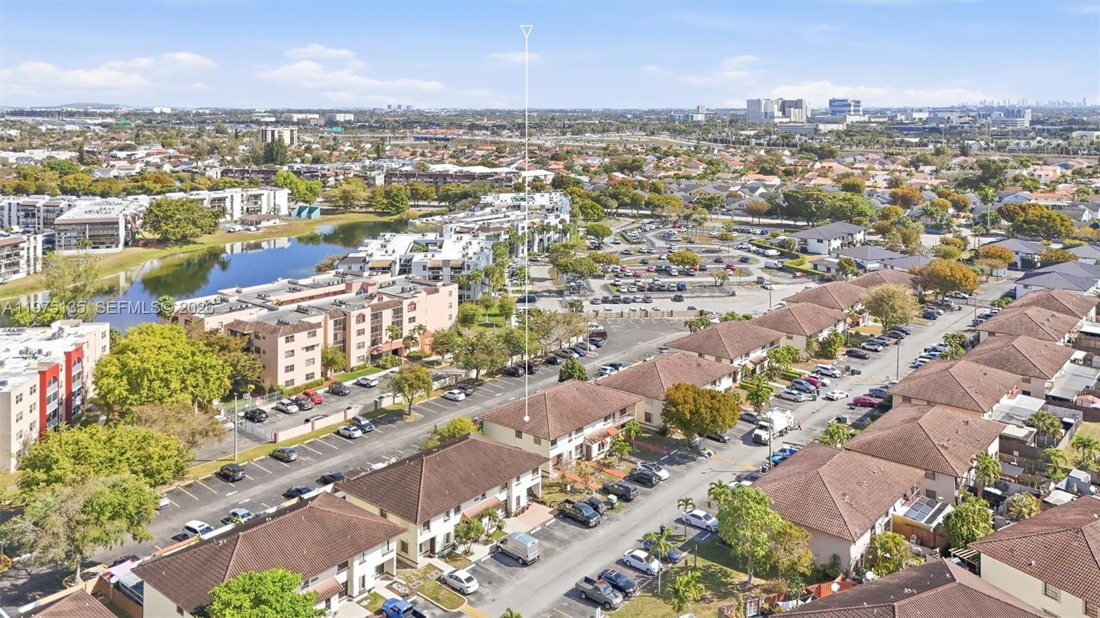 12253 Southwest 16th Terrace, Unit 108M Miami, FL 33175 - Photo 36 of 50 an aerial view of city and lake