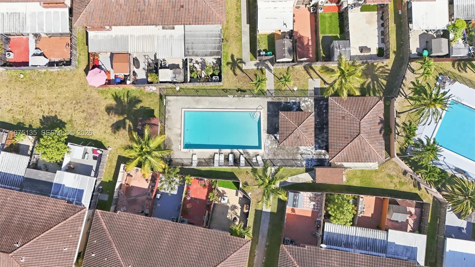 12253 Southwest 16th Terrace, Unit 108M Miami, FL 33175 - Photo 37 of 50 a view of swimming pool with outdoor seating