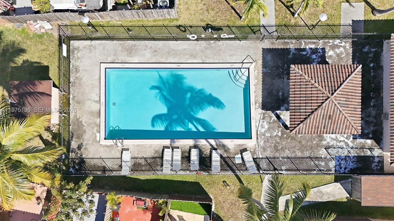 12253 Southwest 16th Terrace, Unit 108M Miami, FL 33175 - Photo 38 of 50 swimming pool with a couch and a coffee table