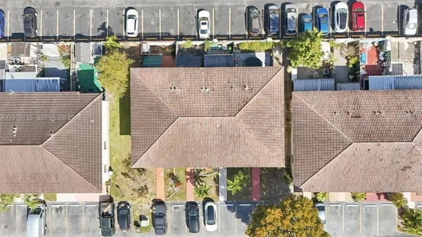 a view of roof deck with patio