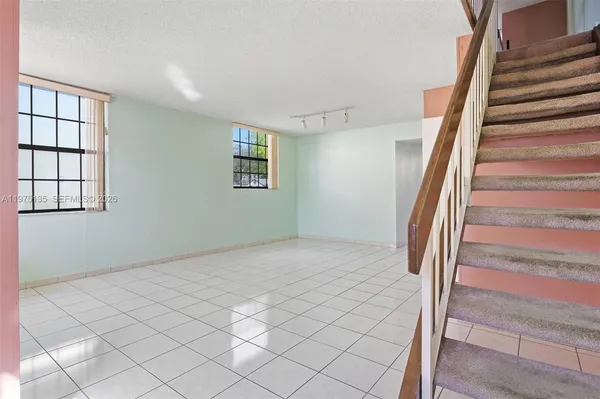 a view of an entryway with staircase