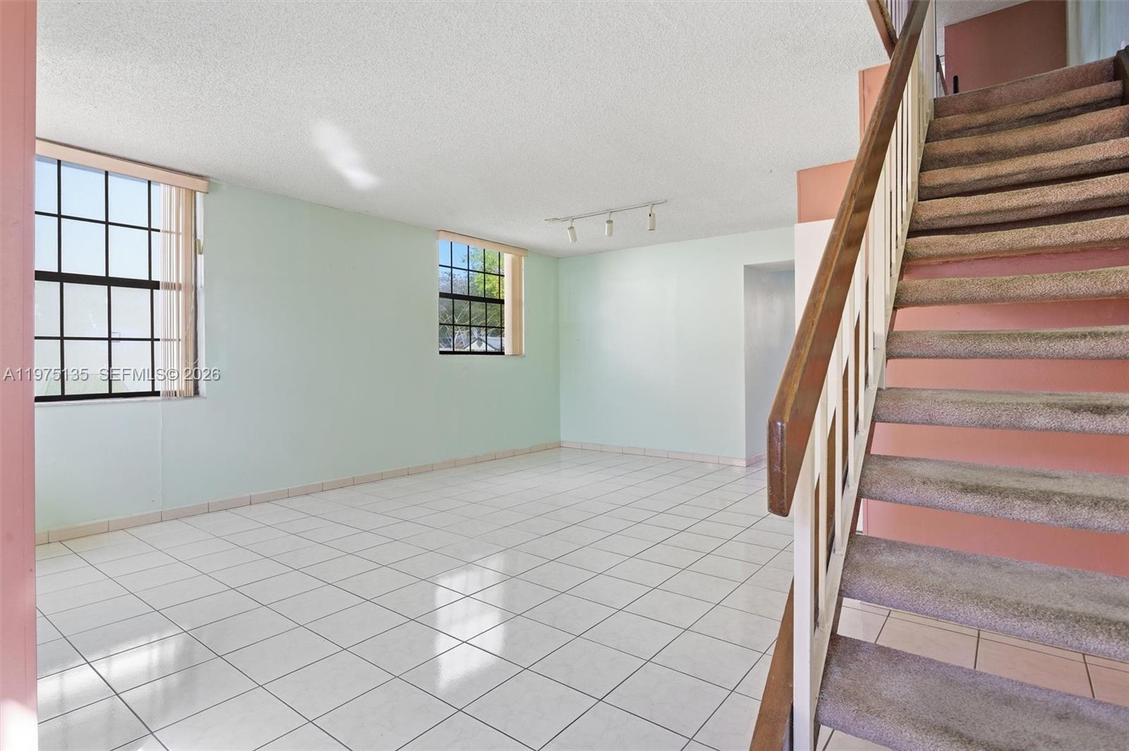 12253 Southwest 16th Terrace, Unit 108M Miami, FL 33175 - Photo 8 of 50 a view of an entryway with staircase