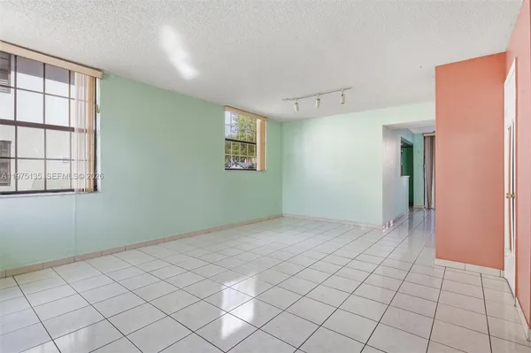 a view of an empty room with window