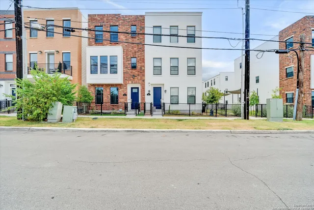 a view of a building with a swimming pool