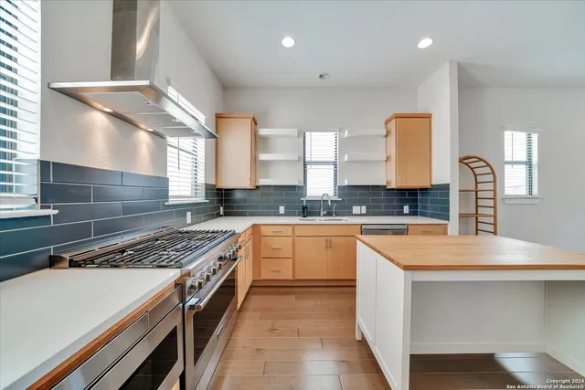 a room with furniture and wooden floor