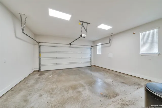 a view of a backyard with sitting area