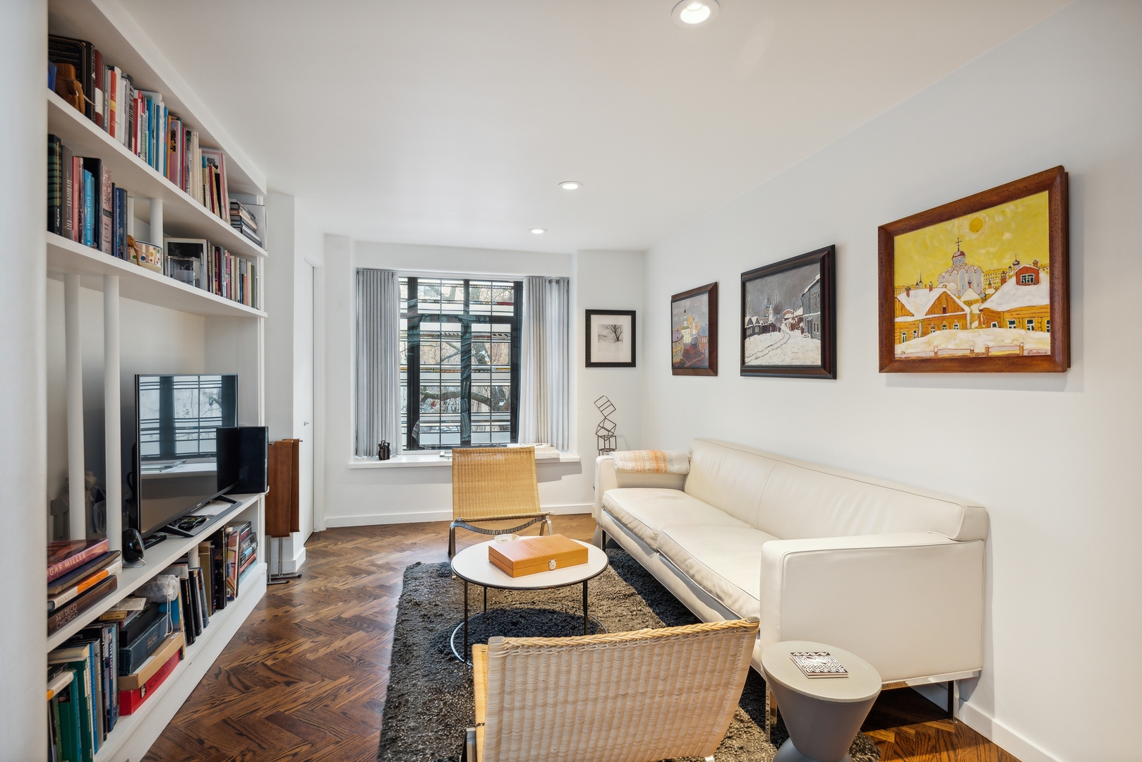 1209 North State Parkway, Unit 13 Chicago, IL 60610 - Photo 13 of 37 a living room with furniture and a flat screen tv