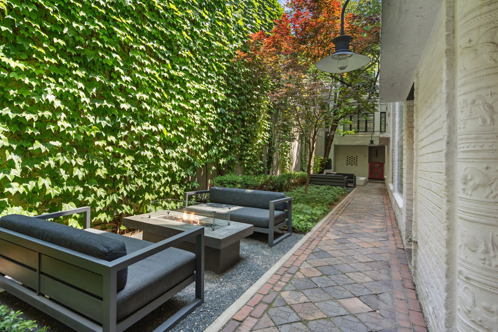 1209 North State Parkway, Unit 13 Chicago, IL 60610 - Photo 2 of 37 a view of a outdoor sitting area with furniture
