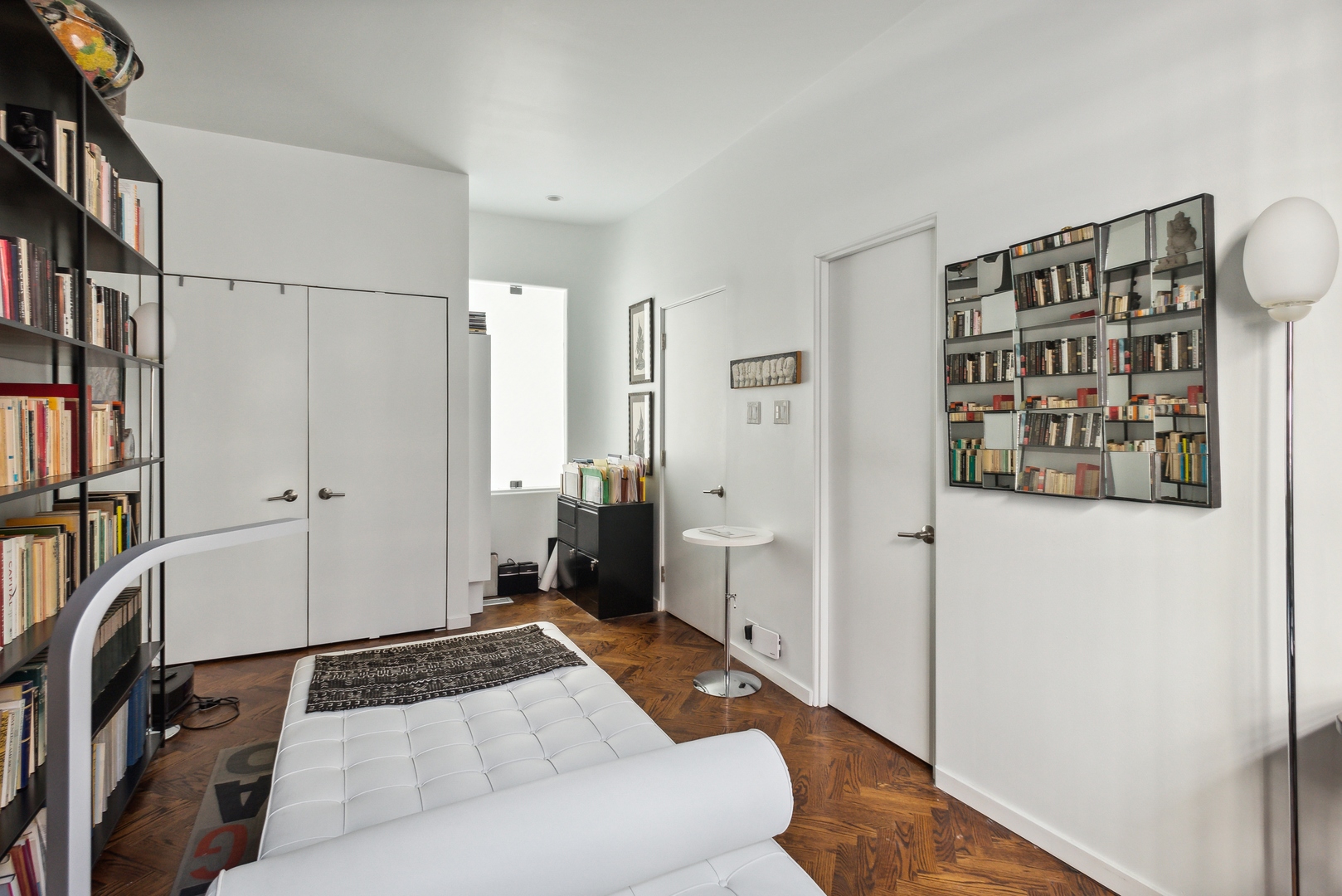 1209 North State Parkway, Unit 13 Chicago, IL 60610 - Photo 23 of 37 a bedroom with a bed and a window