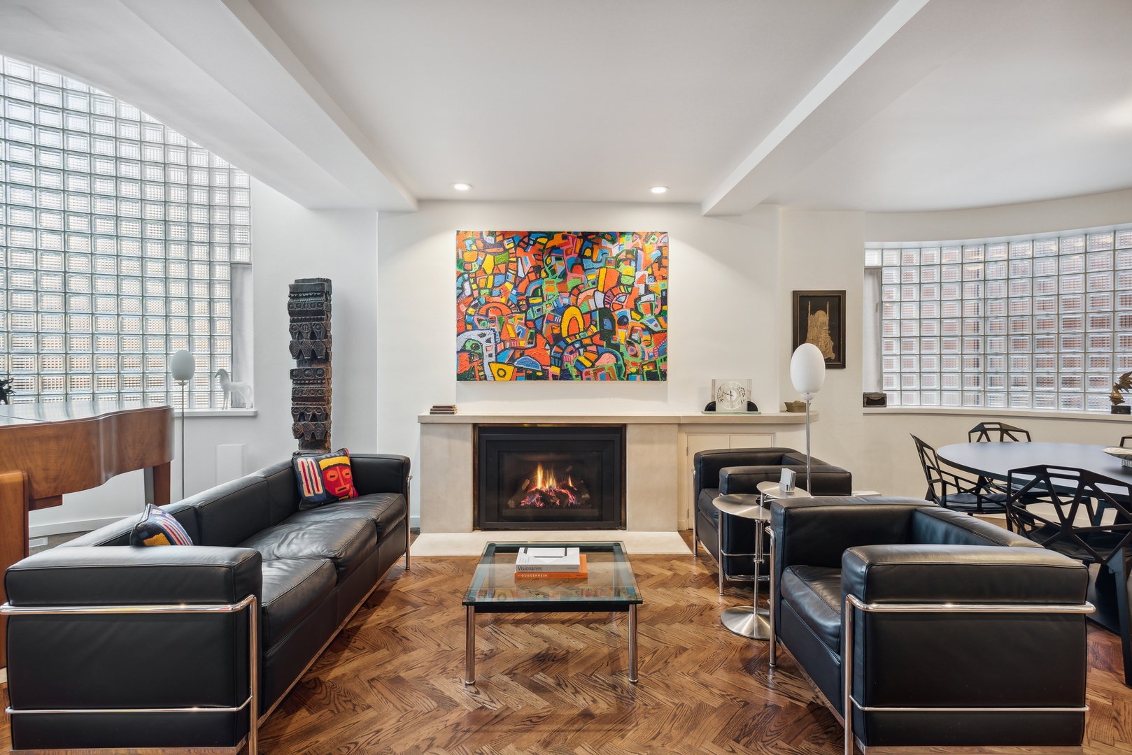 1209 North State Parkway, Unit 13 Chicago, IL 60610 - Photo 5 of 37 a living room with furniture and a fireplace
