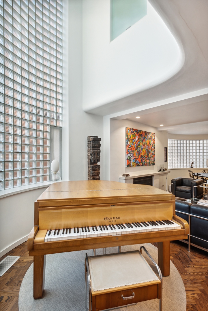 1209 North State Parkway, Unit 13 Chicago, IL 60610 - Photo 8 of 37 a view of a room with furniture and window