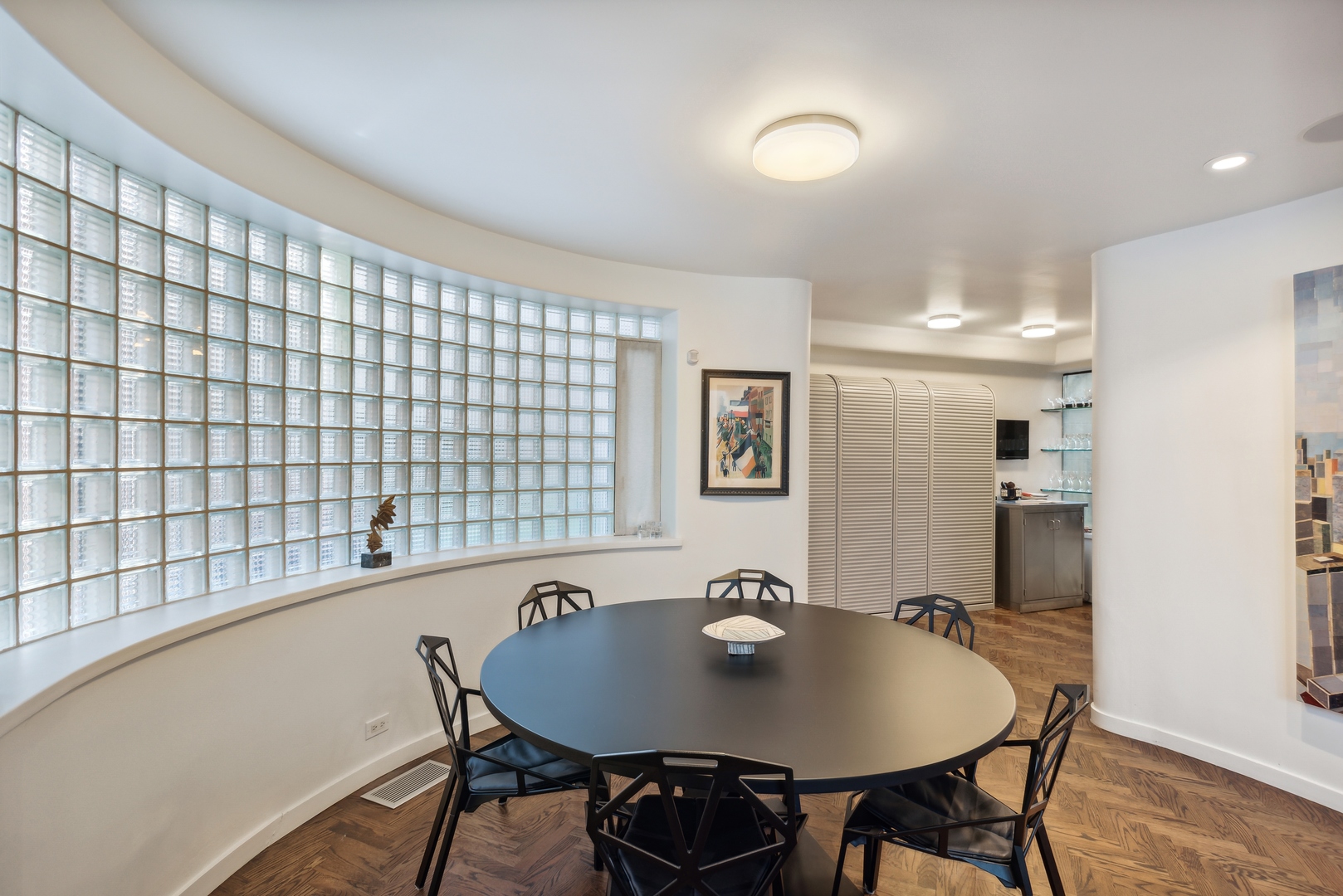 1209 North State Parkway, Unit 13 Chicago, IL 60610 - Photo 9 of 37 a view of a dining room with furniture and wooden floor