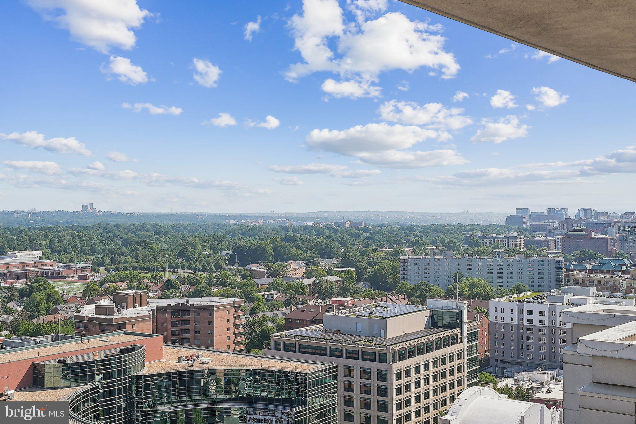851 North Glebe Road, Unit 2008 Arlington, VA 22203 - Photo 36 of 37 Panoramic cityscape under blue skies.