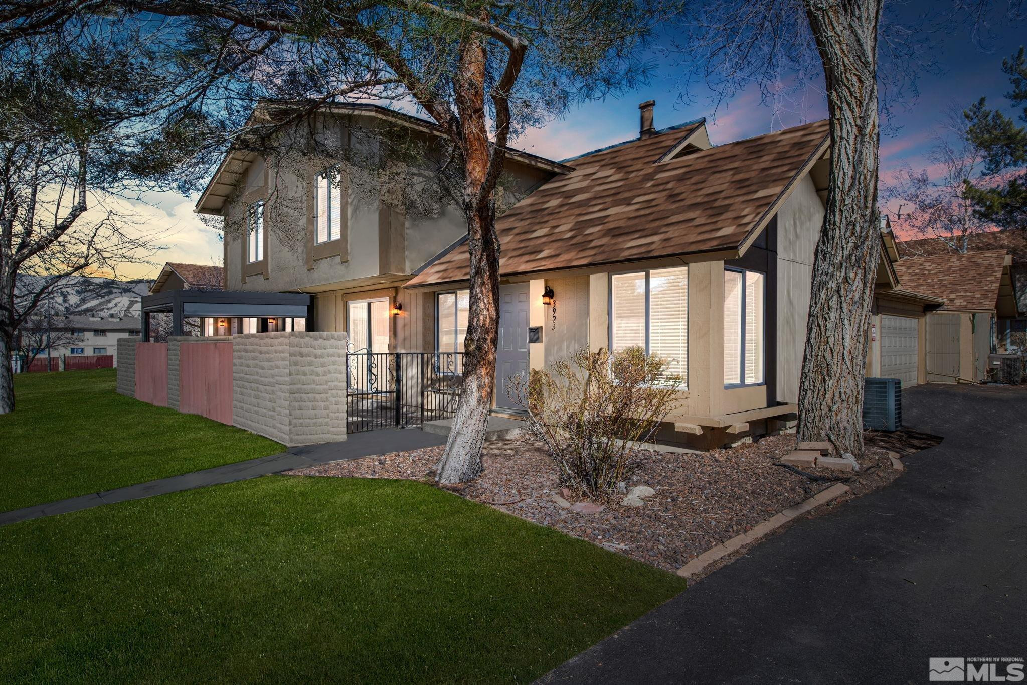 3924 Pheasant Drive Carson City, NV 89701 - Photo 2 of 38 a view of front of a house with a yard