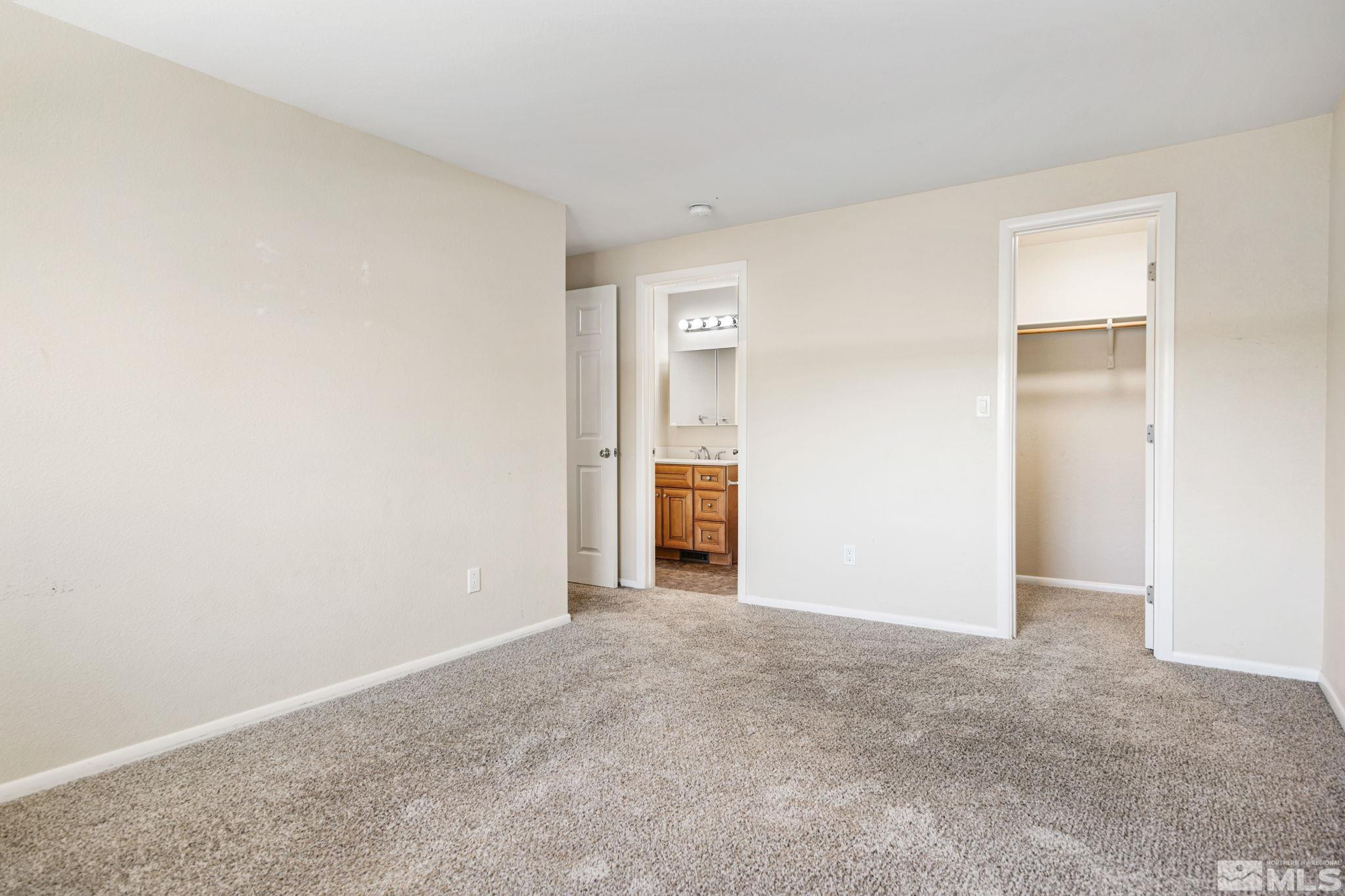 3924 Pheasant Drive Carson City, NV 89701 - Photo 28 of 38 a view of an empty room and fire place