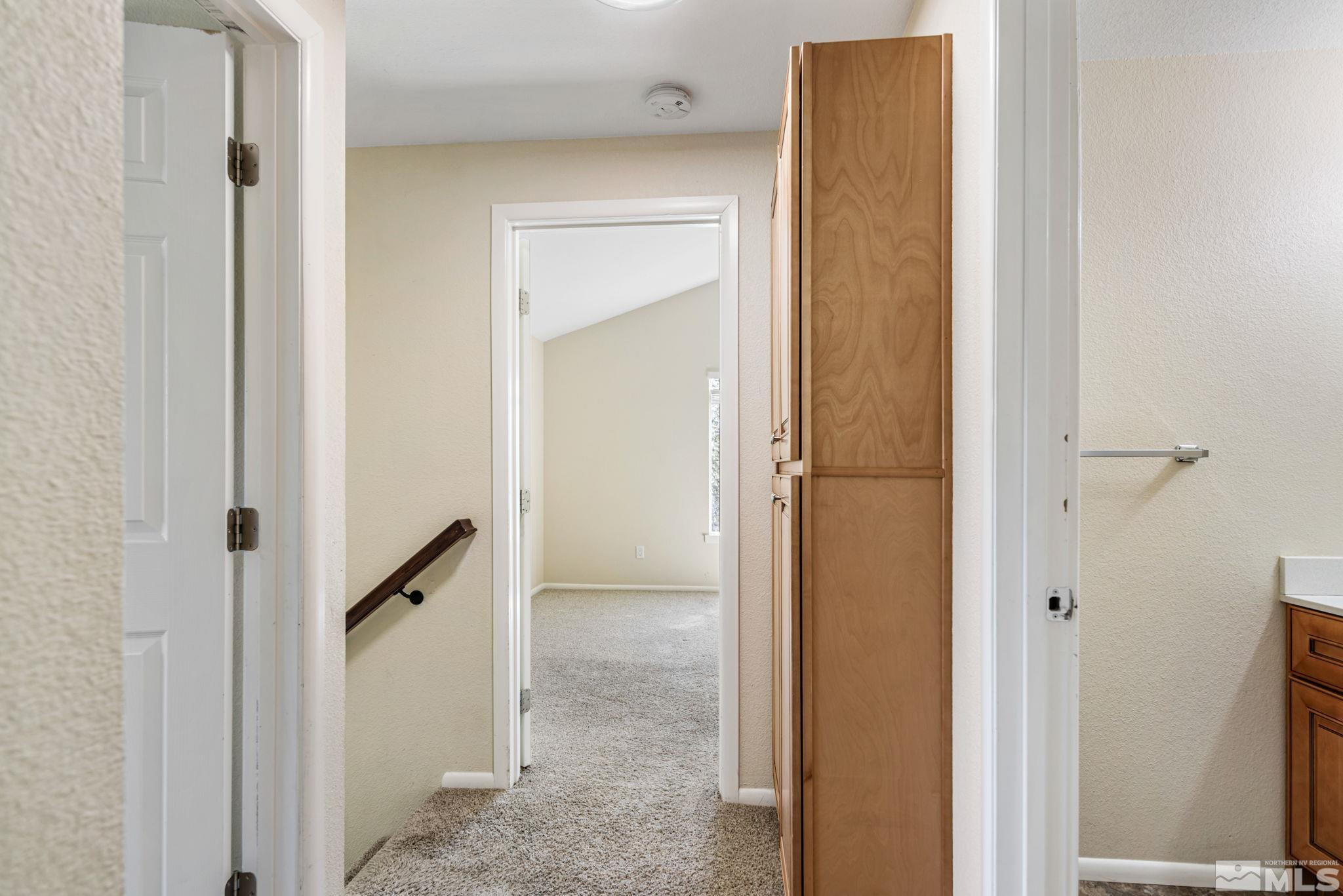 3924 Pheasant Drive Carson City, NV 89701 - Photo 30 of 38 a view of a bathroom from a hallway