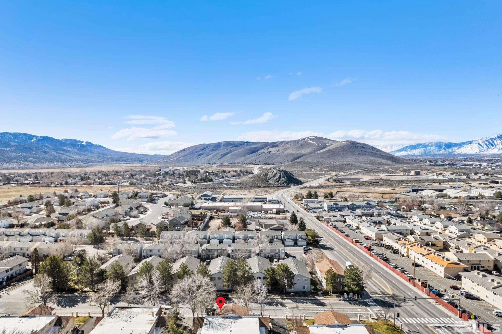 3924 Pheasant Drive Carson City, NV 89701 - Photo 4 of 38 an aerial view of residential houses and city view