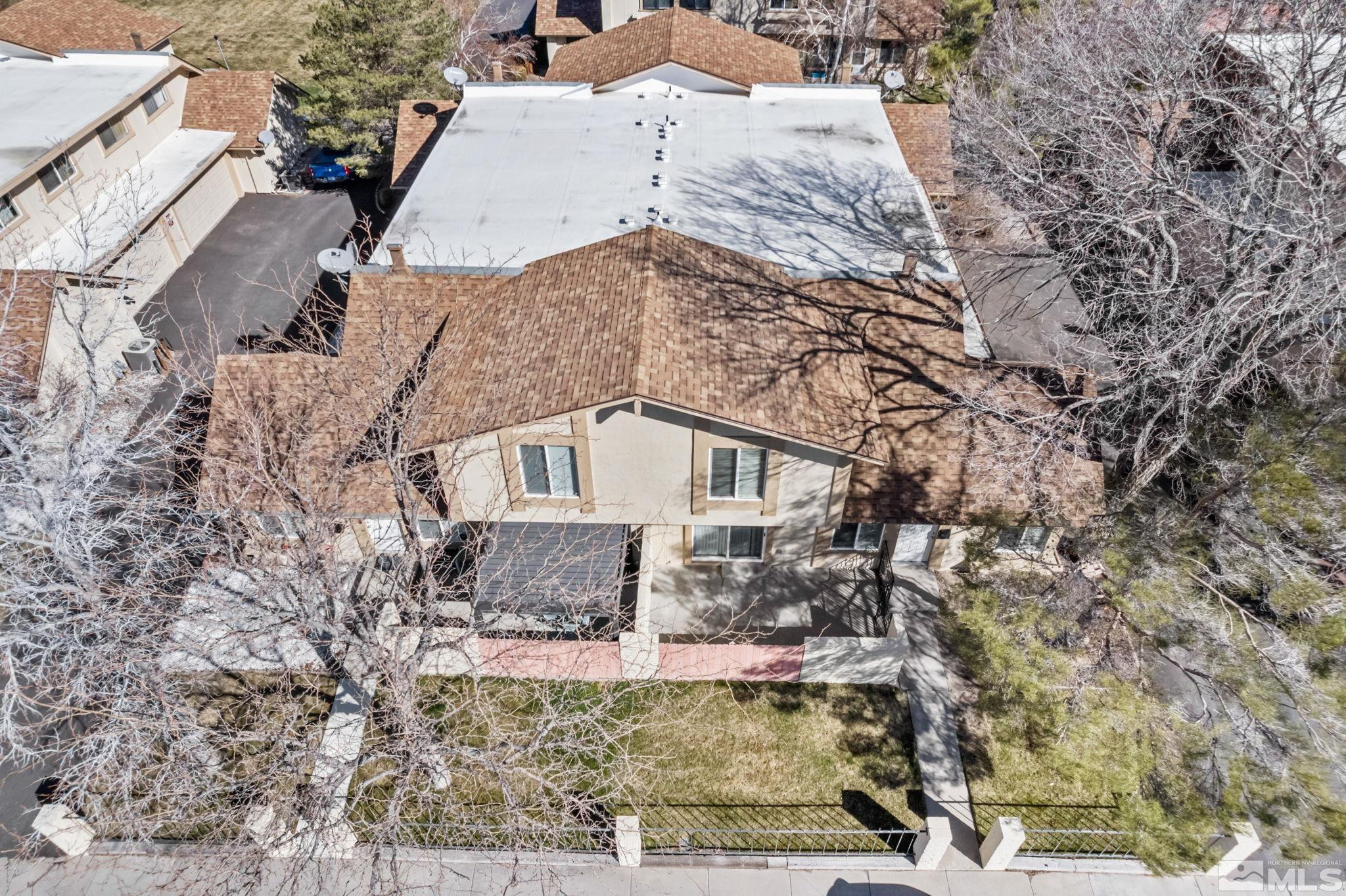 3924 Pheasant Drive Carson City, NV 89701 - Photo 5 of 38 a front view of a house with a yard